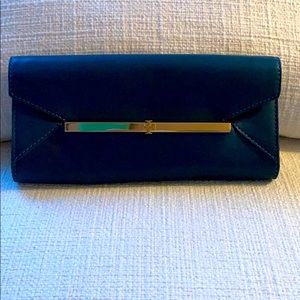TORY BURCH teal leather clutch with gold, like new
